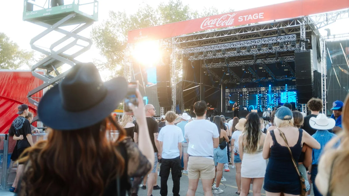 Crowd enjoying a live outdoor music festival performance during CMA Fest in Nashville