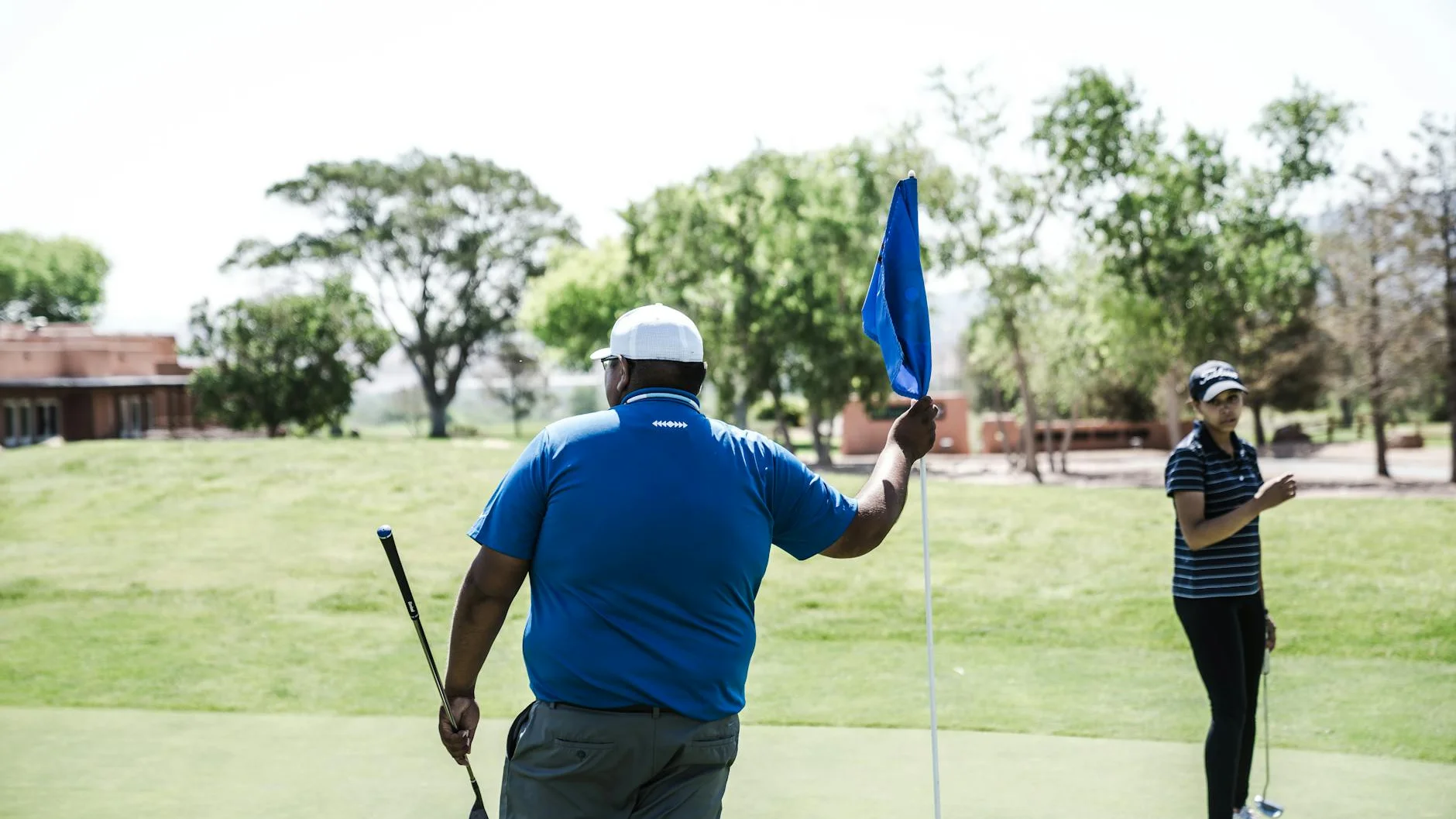 Corporate hospitality suite at a premier golf tournament with executives networking