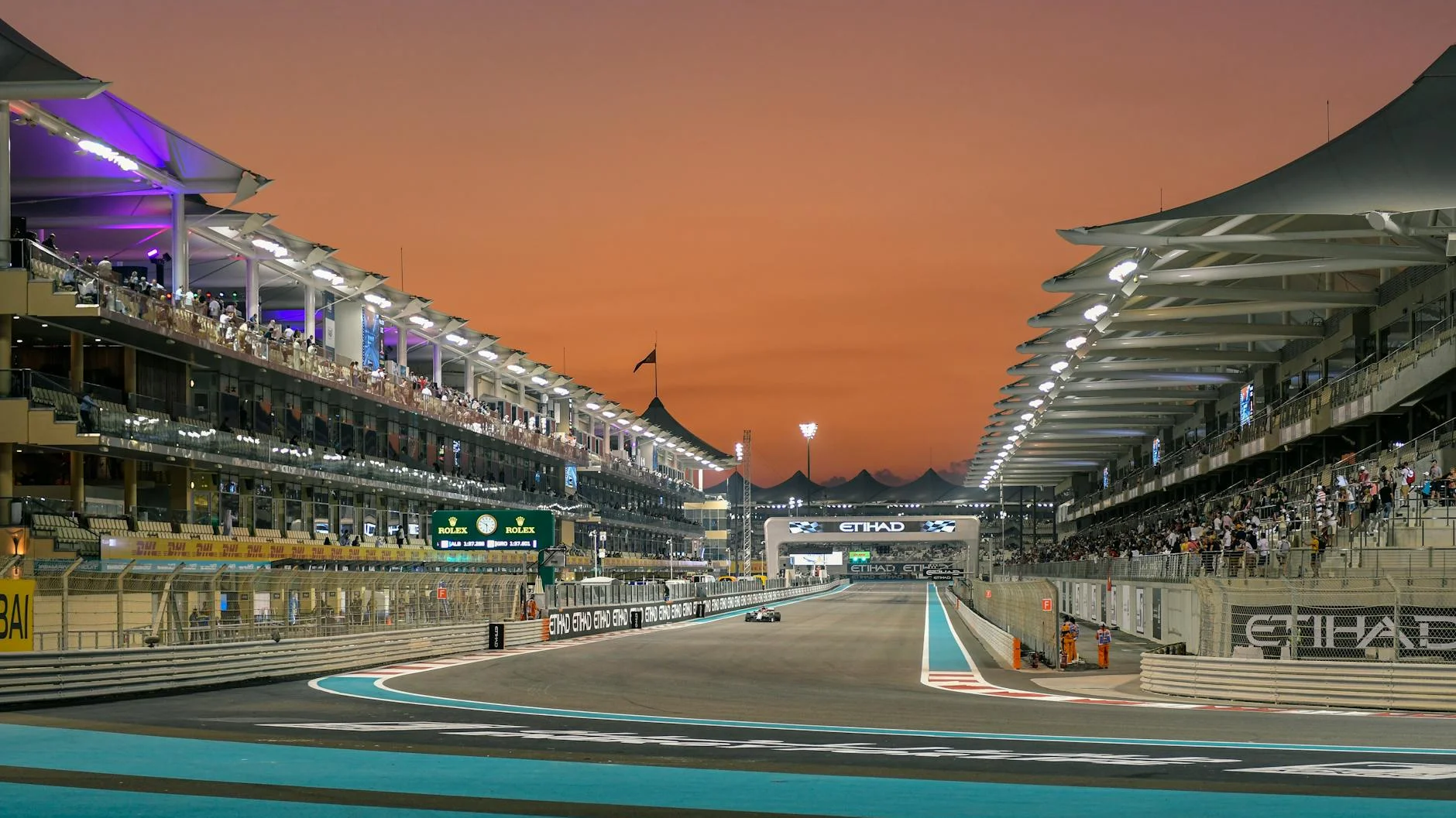 VIP hospitality suite overlooking the Las Vegas Grand Prix pit straight with F1 cars on track