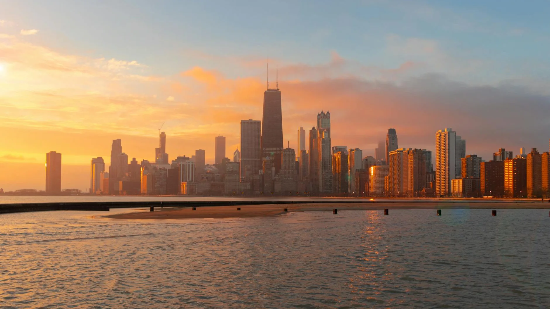 Lollapalooza VIP lounge area with premium seating and Chicago nightlife skyline