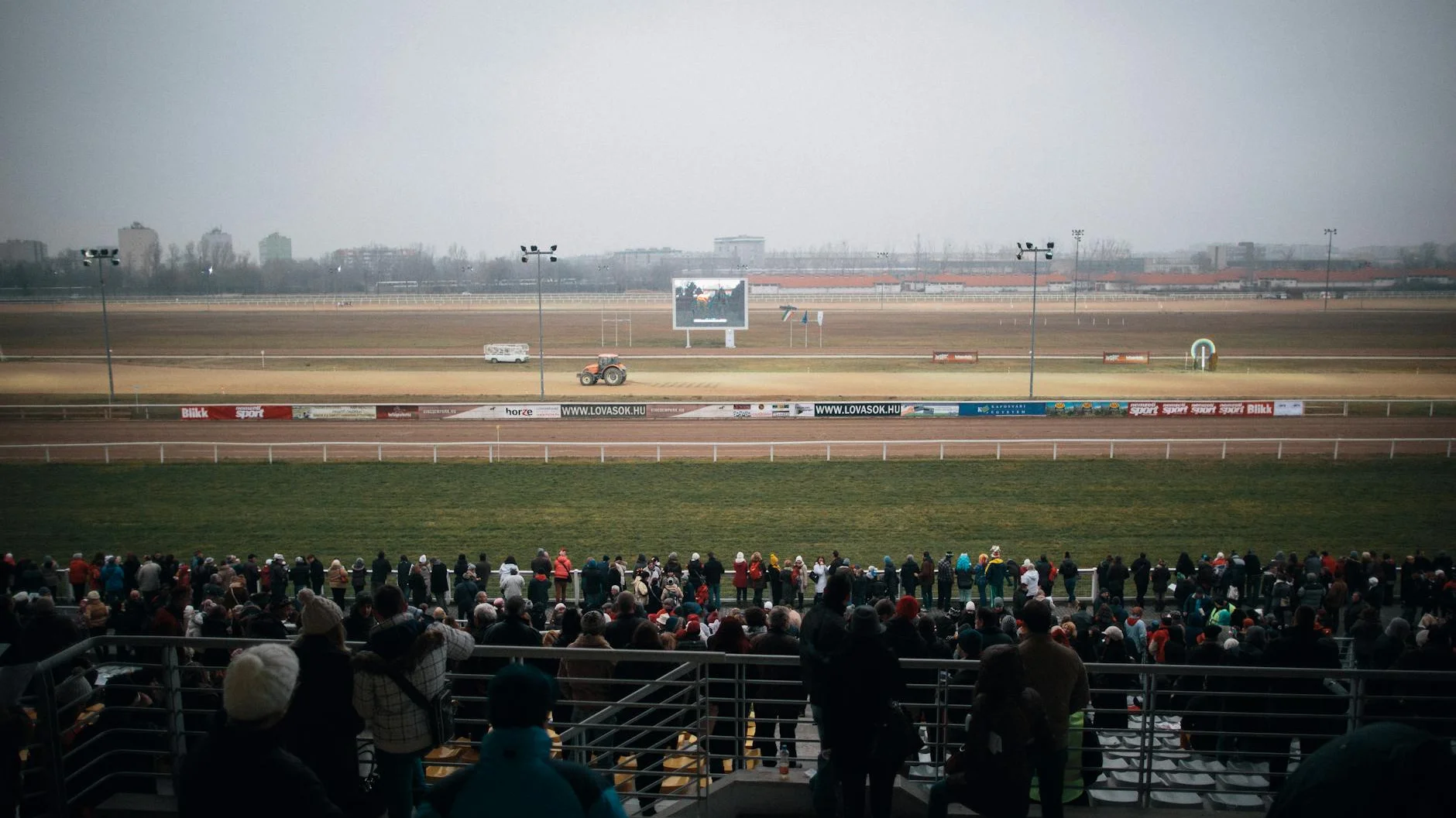 VIP hospitality suite at Preakness Stakes with premium dining and racetrack views