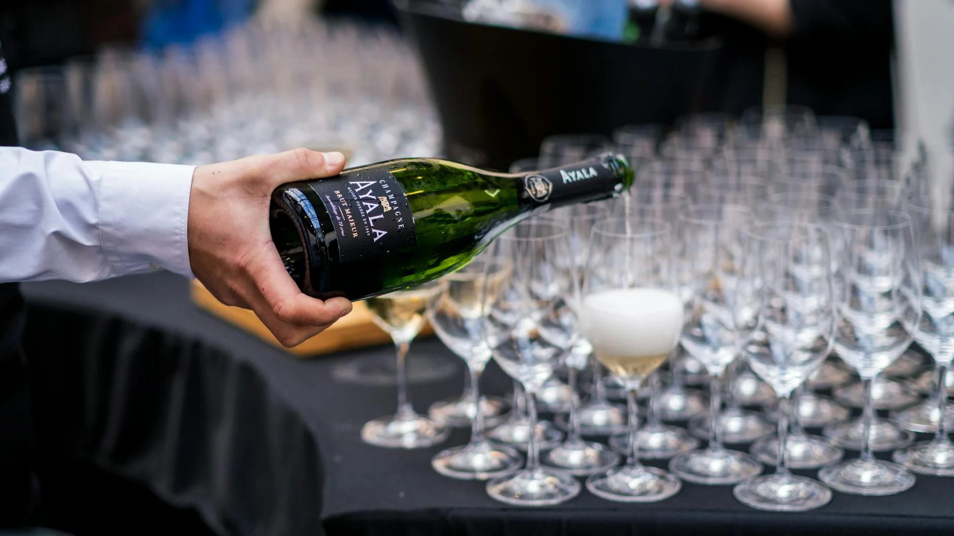 Champagne service at a premium VIP hospitality event for Stagecoach Festival guests