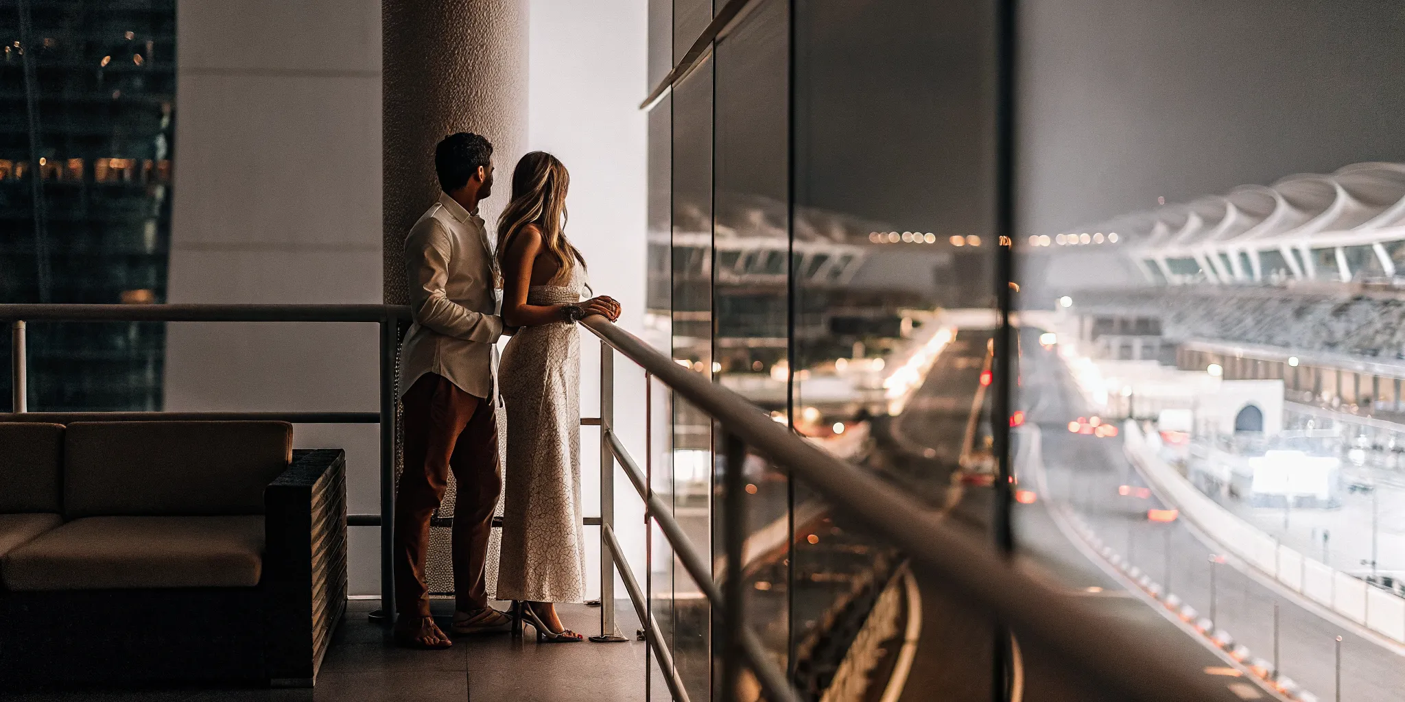 Couple celebrating a milestone at a luxury sports event