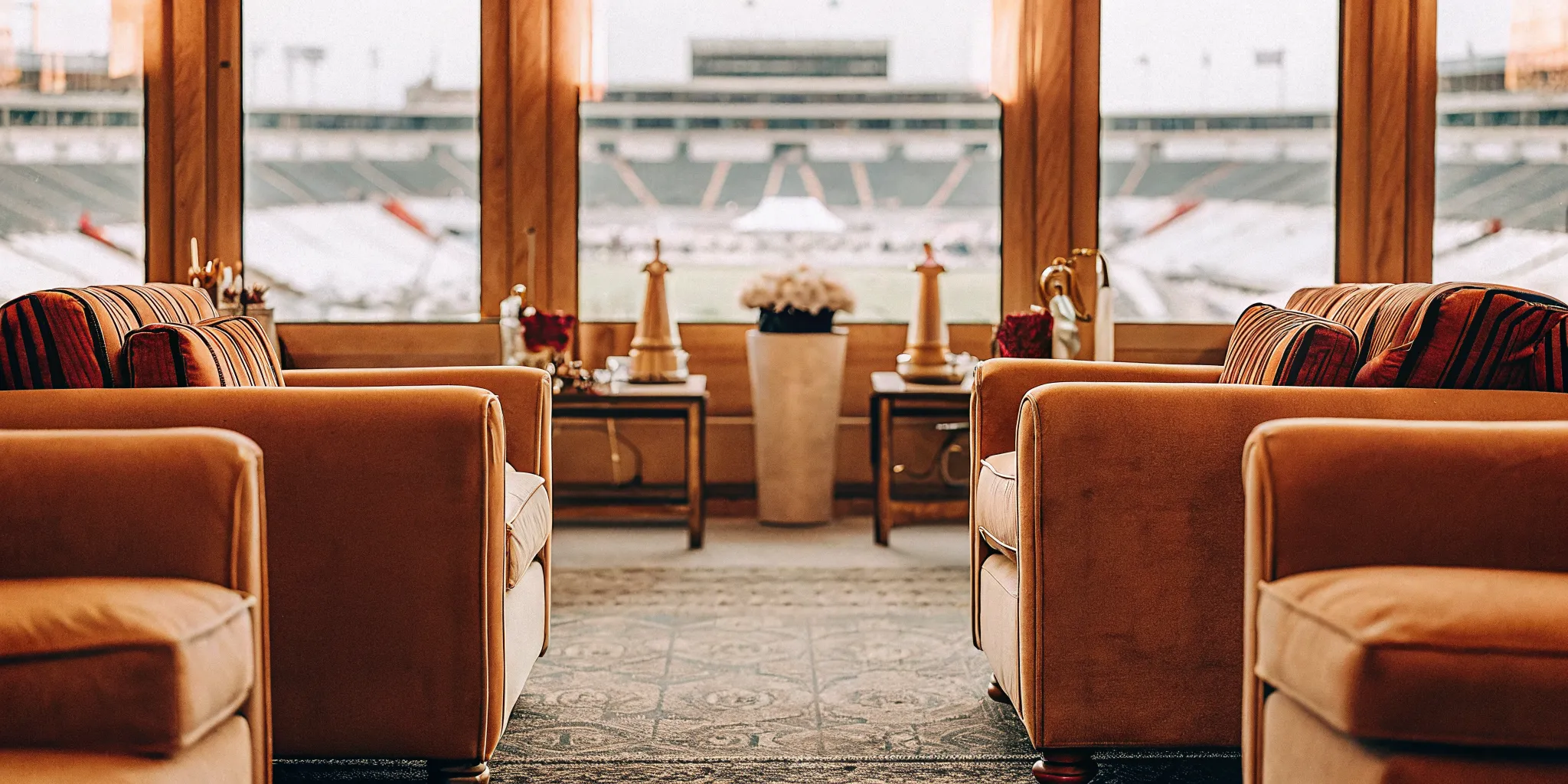 Luxury VIP hospitality suite at the Olympic Games with premium seating and elegant lounge