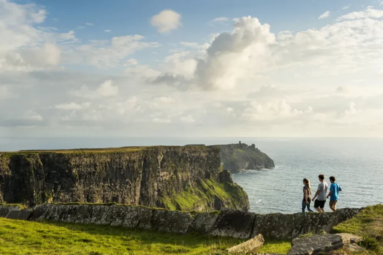 Friends_walking_the_cliff_top_walk_along_the_Cliffs_of_Moher_Co_Clare_master